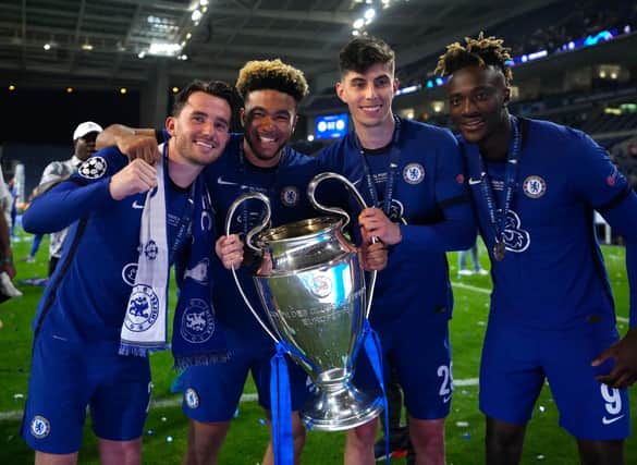 PORTO, PORTUGAL - MAY 29: Ben Chilwell, Reece James, Kai Havertz and Tammy Abraham of Chelsea celebrates with the Champions League Trophy following their team's victory in the UEFA Champions League Final between Manchester City and Chelsea FC at Estadio do Dragao on May 29, 2021 in Porto, Portugal. (Photo by Manu Fernandez - Pool/Getty Images)