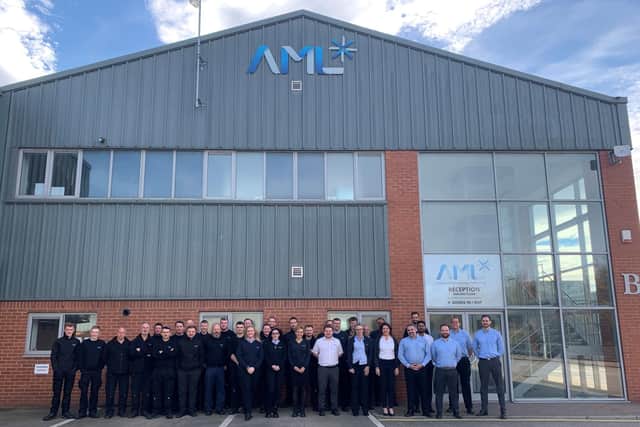 AML staff outside their factory in Rotherham.