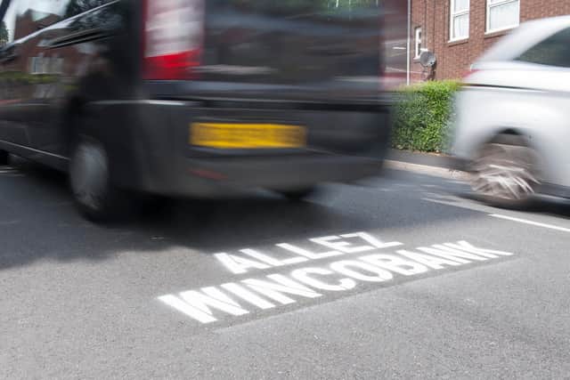 We can speak other languages, too: Allez Wincobank sprayed on Jenkin Road in Sheffield a year after the Tour de France Grand Depart rode up the hill