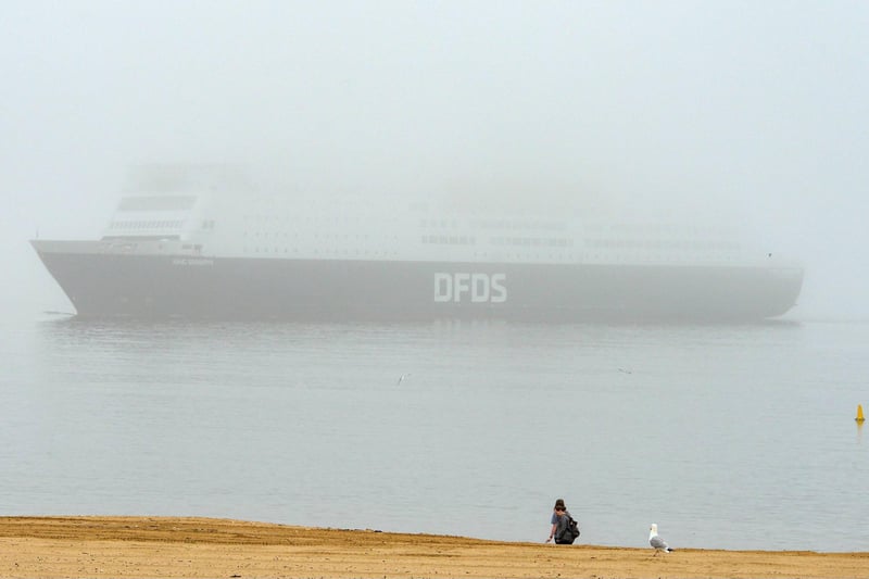 The DFDS ferry sails out to sea.