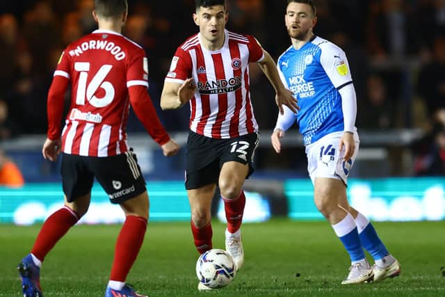 Sheffield United centre-half John Egan is confident of going up providing there is no loss of concentration: David Klein / Sportimage