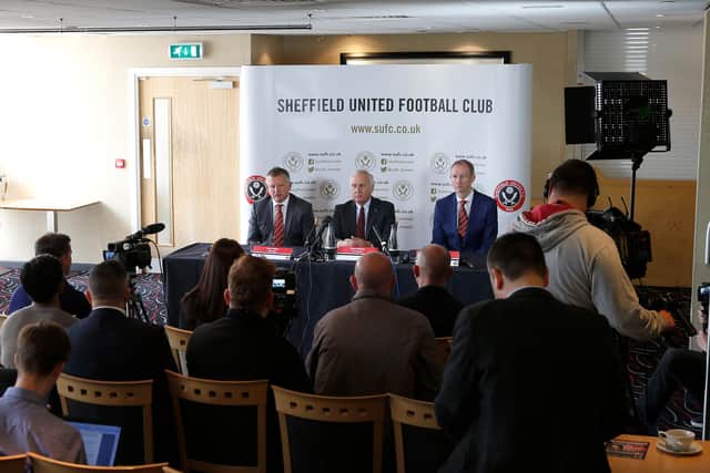 Chris Wilder faces the media as the new Sheffield United manager, alongside Kevin McCabe and Alan Knill: Simon Bellis/Sportimage