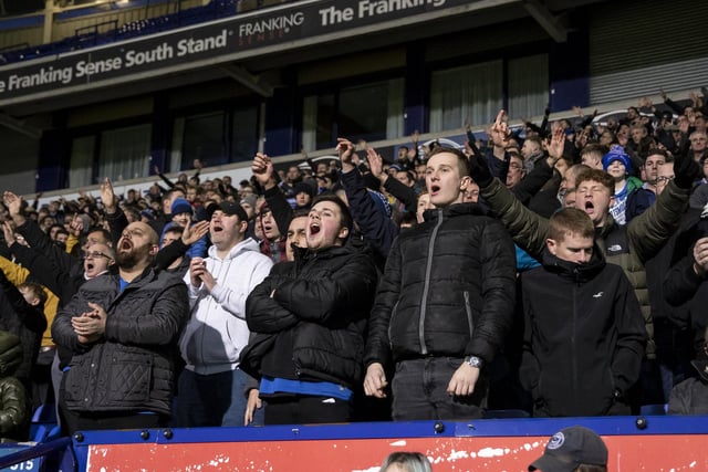 Fans sing during the trip to Bolton.