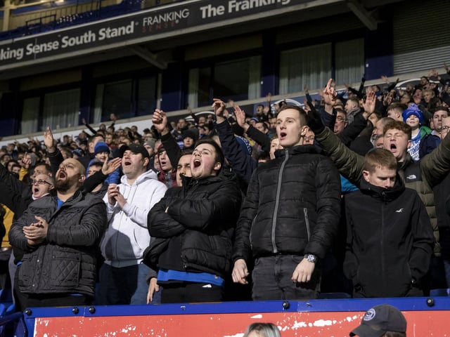 Fans sing during the trip to Bolton.
