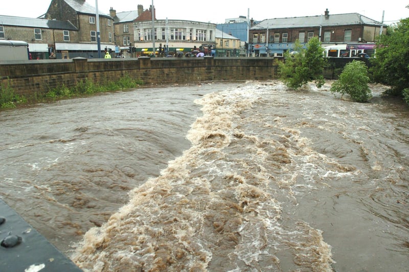 Flood waters rising at the bridge at Hillsborough Corner in June 2007