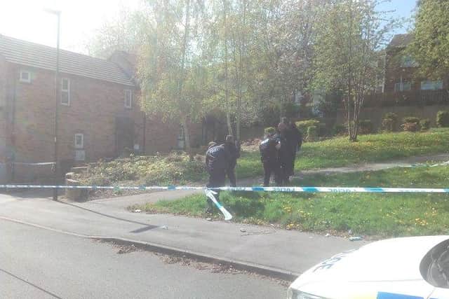 A gunman who opened fire in a Sheffield street remains at large