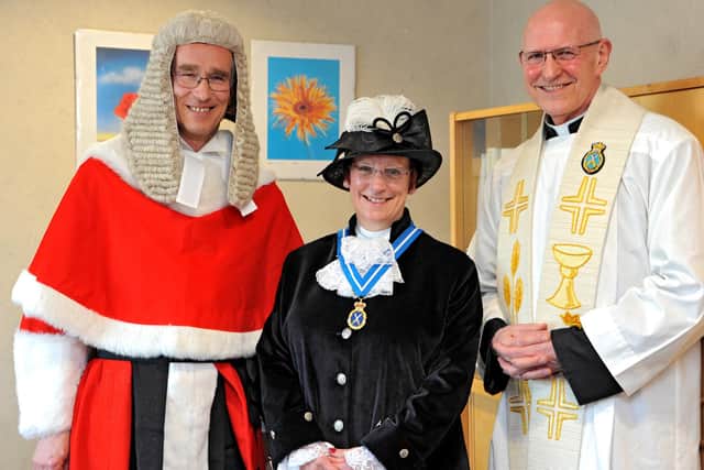 Julie with her chaplain, Father John Cooke and Mr Justice Males