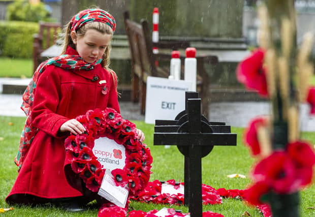 Amelia Armstrong, ten, laid Poppy Scotland’s wreath, a few veterans joined her in Princes Street Garden during a virtual service.