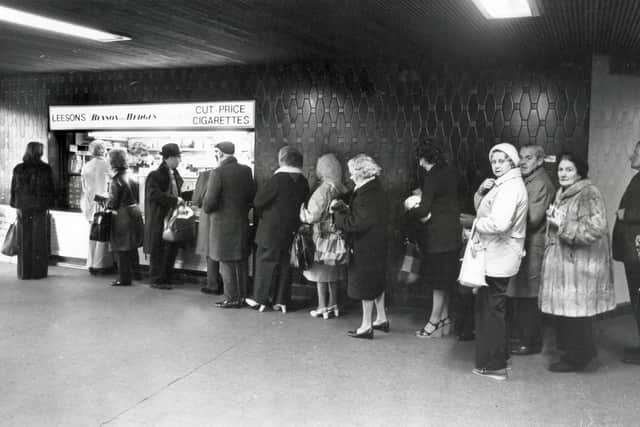 Queue outside a cigarette kiosk in Sheffield's Hole in the Road on Budget Day - March 29, 1977