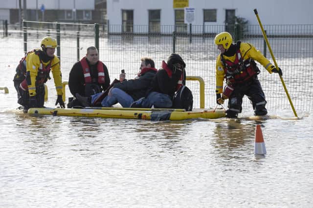 Firefighters attend many non-fire related incidents including rescuing families from flooded homes