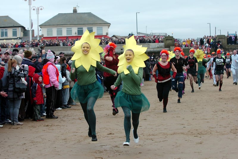 Crowds look on as the dippers come down onto the beach at the Seaburn Boxing Day dip in 2008.