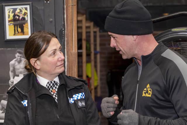 South Yorkshire Police Chief Constable Lauren Poultney chats with Reagan Denton during a visit to De Hood boxing club on the Manor Estate. Picture Scott Merrylees