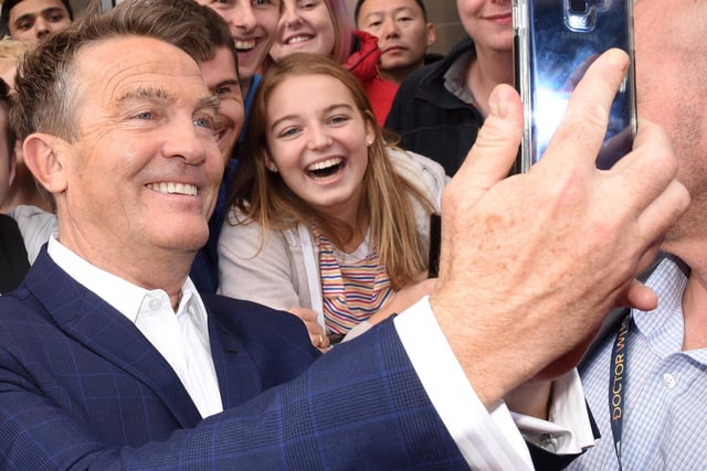 TV star Bradley Walsh, who plays Graham, has a selfie with a fan at the Doctor Who premiere screening at the Light, The Moor, Sheffield in 2018