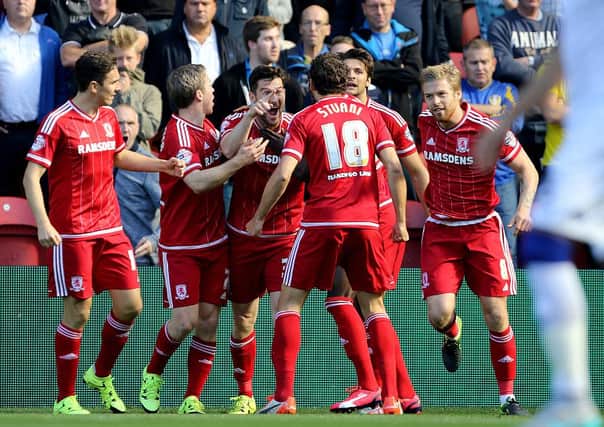 Middlesbrough's David Nugent celebrates with team-mates after scoring against Leeds United.