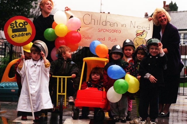 Staff and children at the Cornerhouse Nursery in Hillsborough set off on a charity walk for Children in Need, November 1997