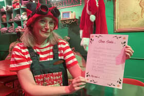 An elf at Santa's Study on Fargate
