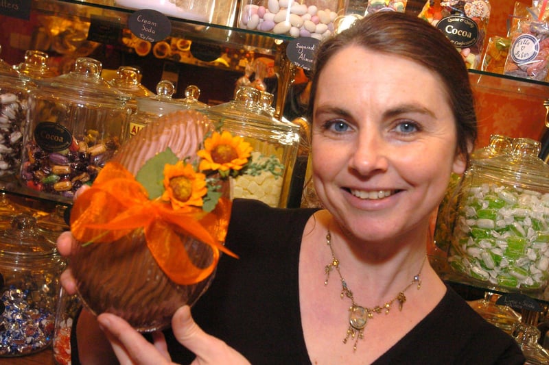 Rachell Burton with an ornate Easter egg at  Cocoa chocolate and sweet shop, Ecclesall Road, Sheffield in 2005