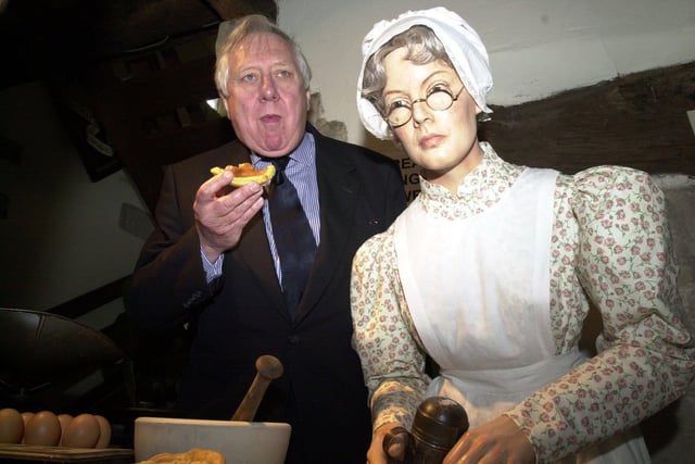 Lord Hattersley with an effigy of alleged Bakewell Pudding originator  Mrs Greaves. Pictured tucking into a Bakewell pudding at the opening of a new exhibition in the town in 2000
