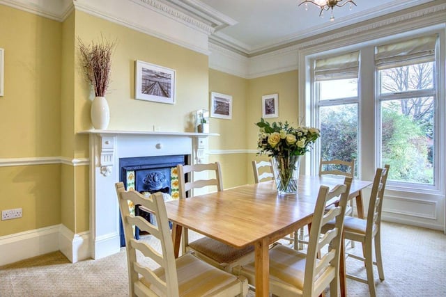 A bright and charming dining room which overlooks the front garden.
