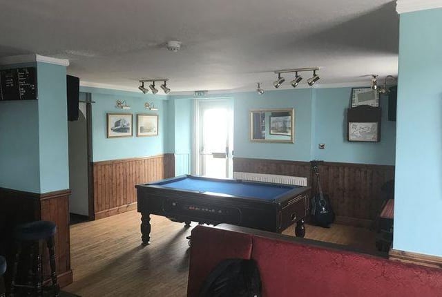 A pool table area for your guests. Or just for you after a long day.