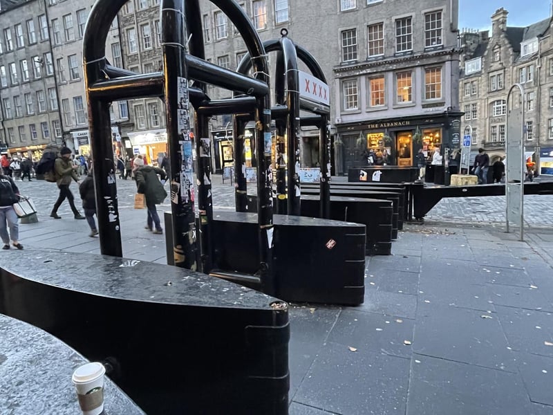 Anti-terrorism barriers in the Royal Mile would be replaced. The barriers, described as "hostile vehicle mitigations", were installed as temporary measures in 2017 following terrorist attacks in London and Manchester. They are widely regarded as unsightly and have to be replaced by 2027. Transport convener Stephen Jenkinson said the permanent barriers would be "more aware of the surroundings of the High Street".