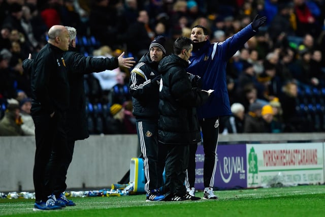 Hull manager Steve Bruce and Sunderland manager Gus Poyet argue after Poyet is sent to the stand during the Premier League match at the KC Stadium on March 3, 2015.