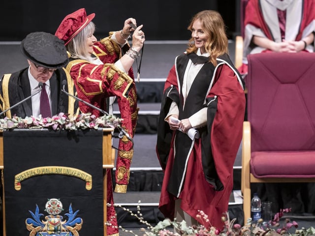 Chancellor of Sheffield Hallam University Baroness Helena Kennedy (left) presents Geri Halliwell-Horner (right) with an honorary doctorate from Sheffield Hallam University at Ponds Forge International Sports Centre in Sheffield. Picture date: Tuesday November 22, 2022.