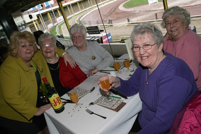 Gloria Stewart with some of the guests at the dinner for those lonely this Christmas at Owlerton Stadium in 2011