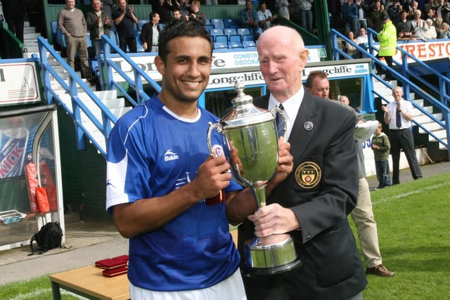 Lester recieves the Derbyshire Centenary Cup at Saltergate after Chesterfield beat Derby County 2-1 in July 2009.