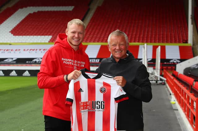Goalkeeper Aaron Ramsdale signs for Sheffield United and is welcomed by manager Chris Wilder at Bramall Lane, Sheffield. Simon Bellis/Sportimage