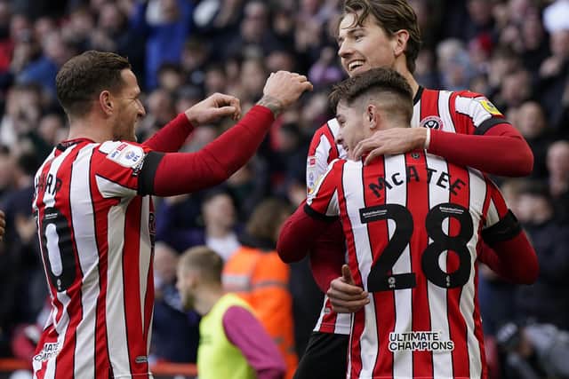 Sander Berge of Sheffield United (R) celebrates after scoring the opening goal against Swansea City at Bramall Lane: Andrew Yates / Sportimage
