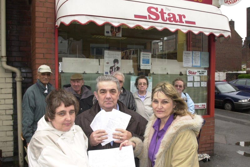 Pictured in 203 on Abbeydale Road, outside the Post Office on the corner of Lynmouth Road, Sheffield,  Locals were unhappy over a threat to close the office down. Seen LtoR isBrenda Brusell as she handed over a petition to Councillor Patricia White,  with Councillor Andrew White with letters they have received from the office users. In the background are some of the post office users.