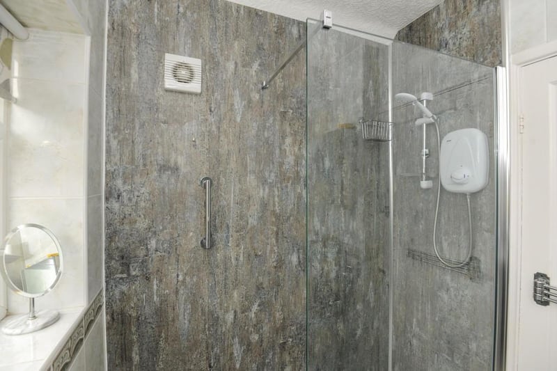 The property boasts a modern shower room with white suite and separate toilet.