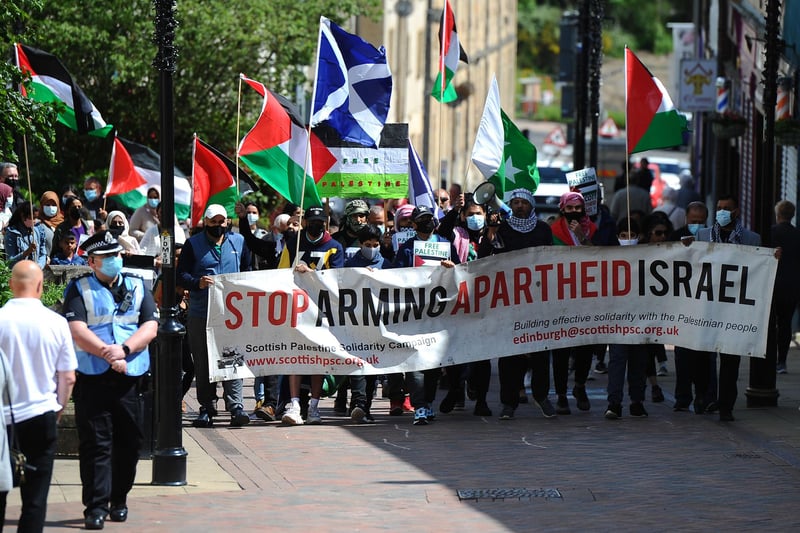 Falkirk's High Street hosted a peace rally as organisers stood in solidarity with the Palestinian people. The event was led by the Central Scotland Regional Equality Council, Al Masaar SCIO and Falkirk Central Mosque. Picture: Michael Gillen.