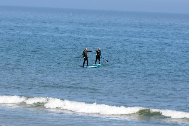 Paddle boarders enjoying the high temperatures at Seaburn Beach during the relaxed lockdown measures.