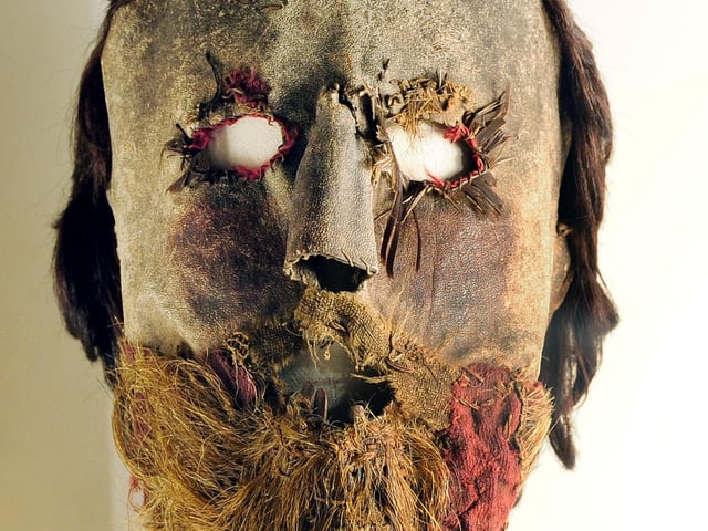 This frightening-looking mask was worn as a disguise by the outlawed Covenanting minister Alexander Peden. The mask is made from leather and fabric. The beard and wig are probably made from real human hair.