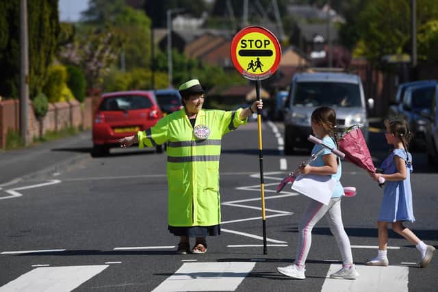 Treeton Lollypop lady, Glynnis Bolton, who has done the job for 20 years. Celebrates her 65th today.
Picture Jonathan Gawthorpe
24th April 2020.
