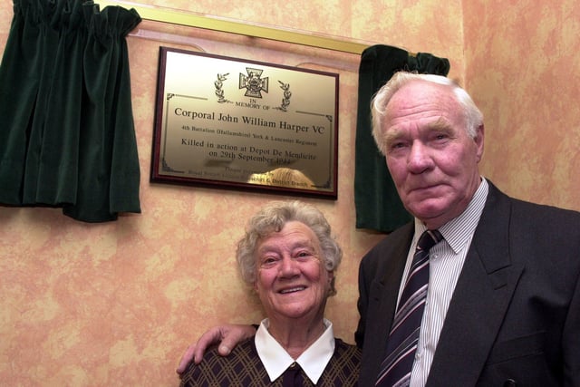 The brother and sister of Victoria Cross winner Corporal John Harper, Peter Harper and Joan Willis are pictured with the plaque in his honour, which was unveiled by Mrs Willis at the Mansion House, Doncaster in 2001