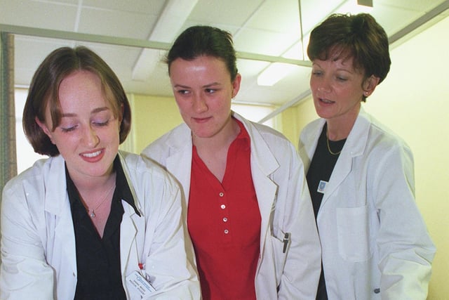 L to r:Medical students, Sarah Wiggs and Julia Foley(both 21) work on a dummy at the Northern General training centre, with teaching co-ordinator Dr. Tessa Dunseath.