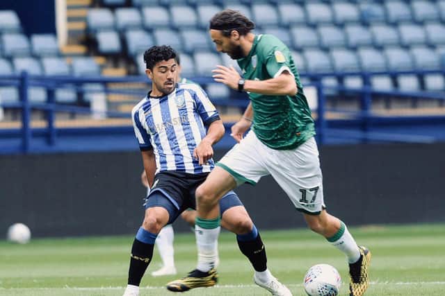 Massimo Luongo and Atdhe Nuhiu tussle in Sheffield Wednesday's session at Hillsborough today. Pic via @swfc | Steve Ellis