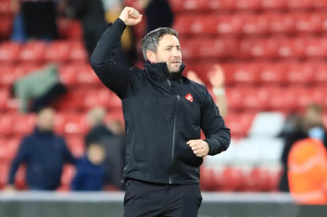 Lee Johnson has some tough decisions to make ahead of Sunderland's trip to Cambridge. Picture by Martin Swinney
