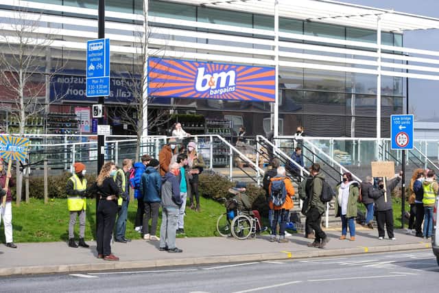 The protesters outside B&M Chesterfield Road. Picture by Dean Atkins