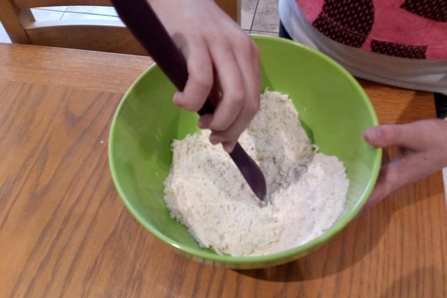 If you managed to stock up on flour before supermarket shelves were cleaned bare, then baking is a great idea. Kids love it - although it can get a bit messy!