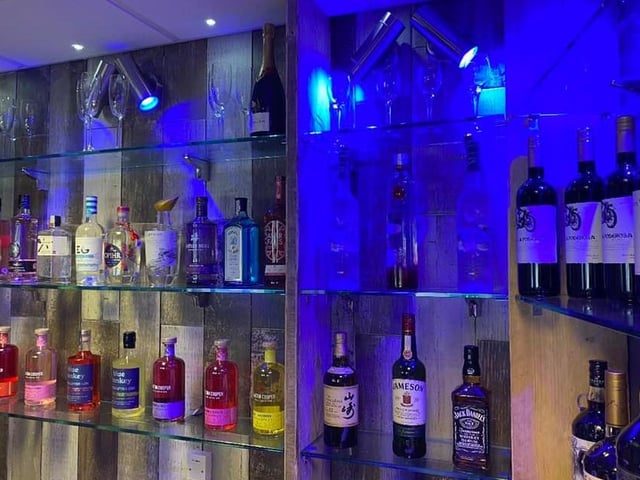 The bar stocks 18 different gins and a selection of wines, spirits and bottled beers.