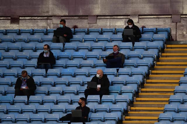 Journalists are seen inside the stadium social distancing during the Premier League match between Aston Villa and Sheffield United at Villa Park on June 17, 2020 in Birmingham, England. (Photo by Shaun Botterill/Getty Images)