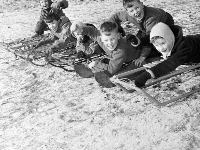 Youngsters sledging on Corstorphine Hill in December 1964.