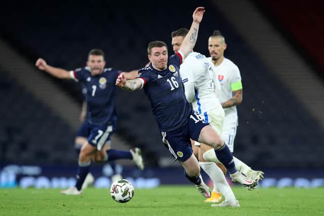 John Fleck of Scotland battles for possession with Lukas Haraslin of Slovakia (Photo by Ian MacNicol/Getty Images)