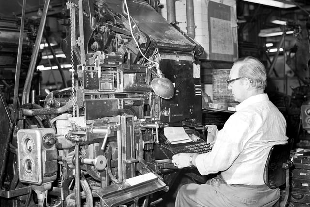 A TSPL compositor using a linotype machine for typesetting The Scotsman newspaper at the North Bridge site, in Edinburgh, July 1980.
