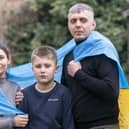 Ukrainian refugees Pavlo Romaniukha (left) with his wife Rymma Parkhomenko-Romaniukha and their son Dmytro Parkhomenko-Romaniukh, who fled Ukraine, speaking at their home in Sheffield, ahead of the first anniversary on Friday of the Russian invasion of Ukraine. PA Photo. Picture date: Wednesday February 22, 2023. Mr Romaniukha said he and his family have been touched by the welcome they have received but, on the eve of the anniversary of the Russian invasion, he warned that Vladimir Putin has to be defeated because his aggression will not stop with Ukraine. See PA story POLITICS Ukraine. Photo credit should read: Danny Lawson/PA Wire 