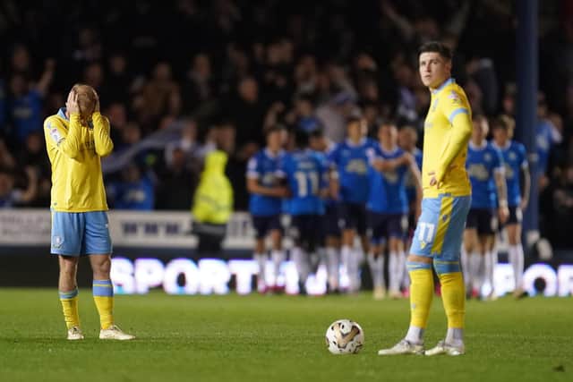 Sheffield Wednesday's Barry Bannan (left) looks dejected after Peterborough United's Kwame Poku scores their side's third goal of the game during the Sky Bet League One play-off, semi-final, first leg match at the Weston Homes Stadium, Peterborough. Picture date: Friday May 12, 2023. PA Photo. See PA story SOCCER Peterborough. Photo credit should read: Mike Egerton/PA Wire.

RESTRICTIONS: EDITORIAL USE ONLY No use with unauthorised audio, video, data, fixture lists, club/league logos or "live" services. Online in-match use limited to 120 images, no video emulation. No use in betting, games or single club/league/player publications.
